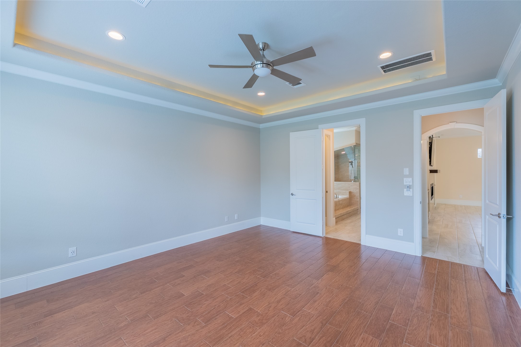 25718 Muirfield Bend Court Spring, TX 77389 - Photo 17 of 50 a view of an empty room with wooden floor