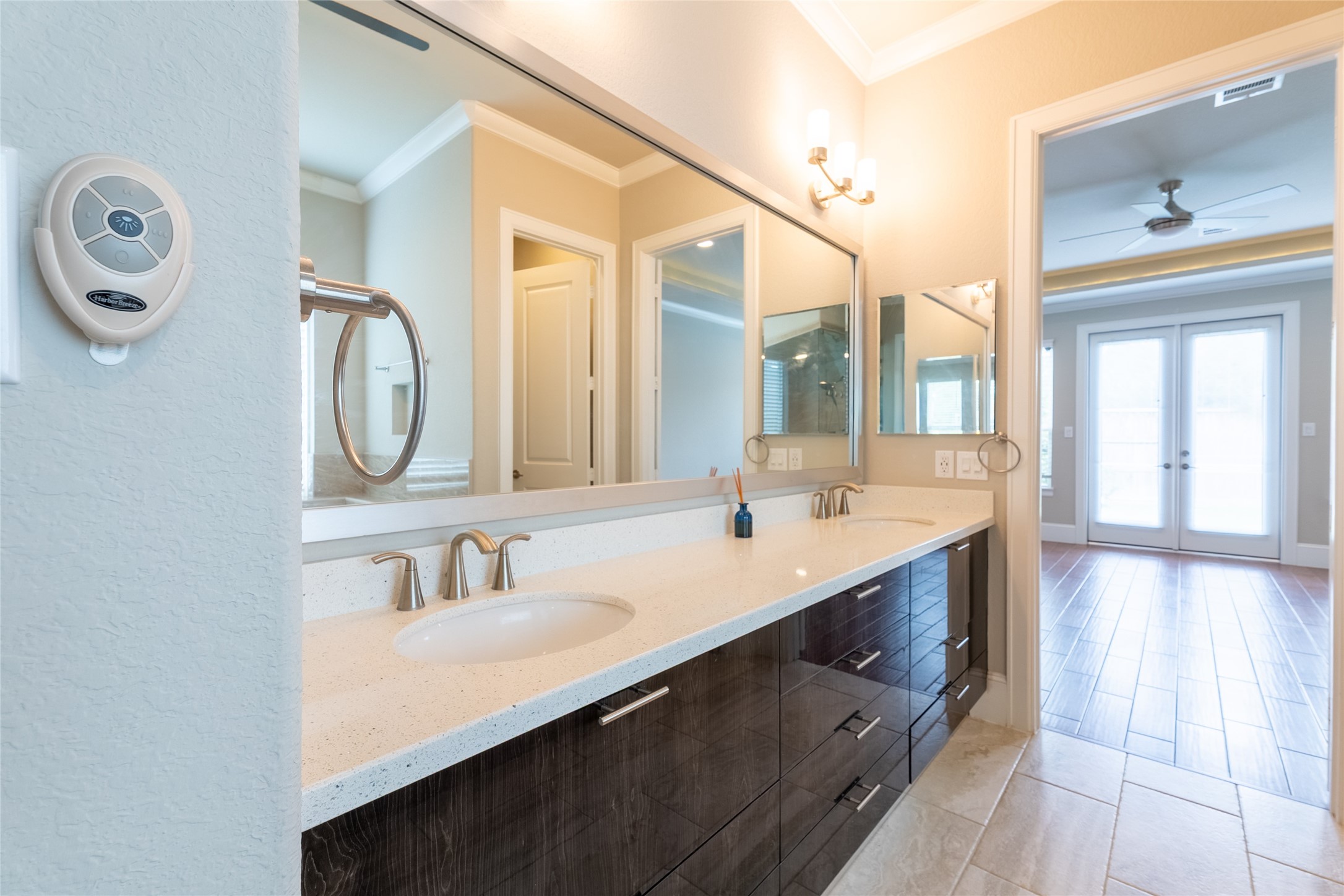 25718 Muirfield Bend Court Spring, TX 77389 - Photo 22 of 50 a bathroom with a double vanity sink and a mirror