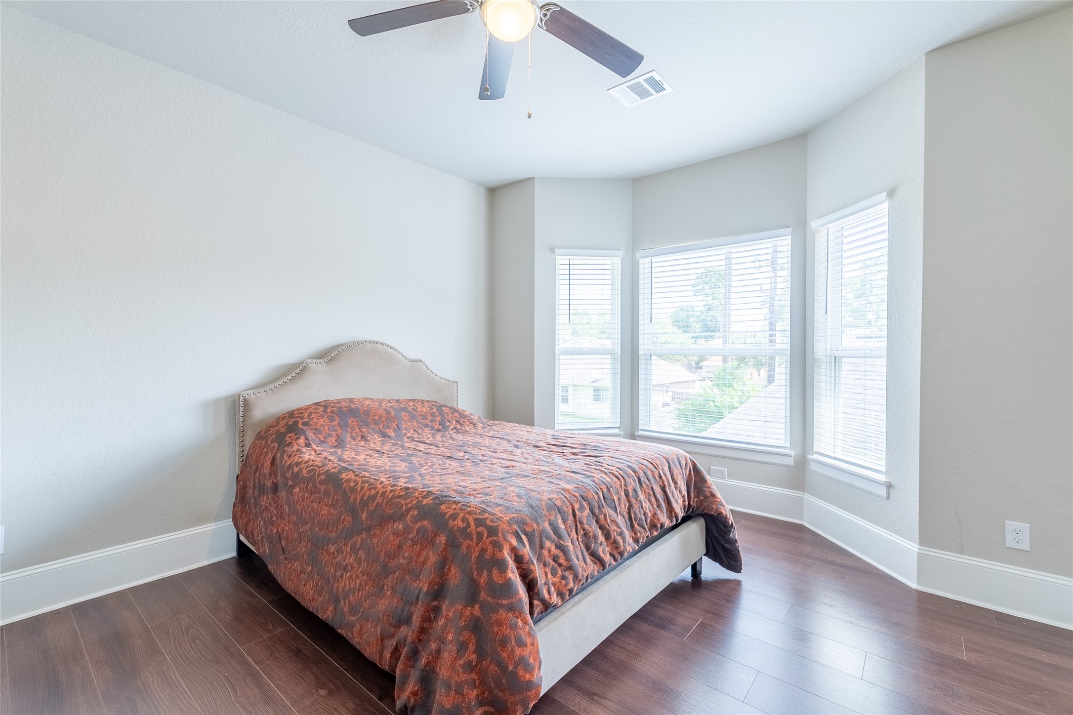 25718 Muirfield Bend Court Spring, TX 77389 - Photo 27 of 50 a bedroom with a bed and window