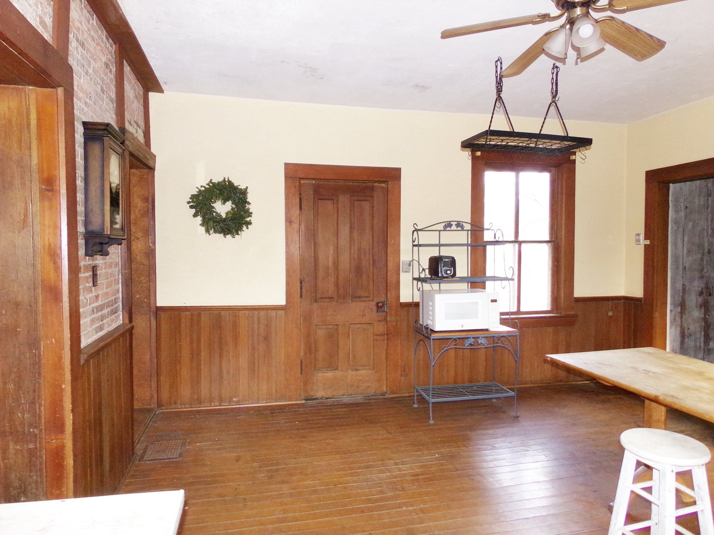 N955 Pouley Road Elburn, IL 60119 - Photo 4 of 23 a view of a livingroom with furniture window and wooden floor
