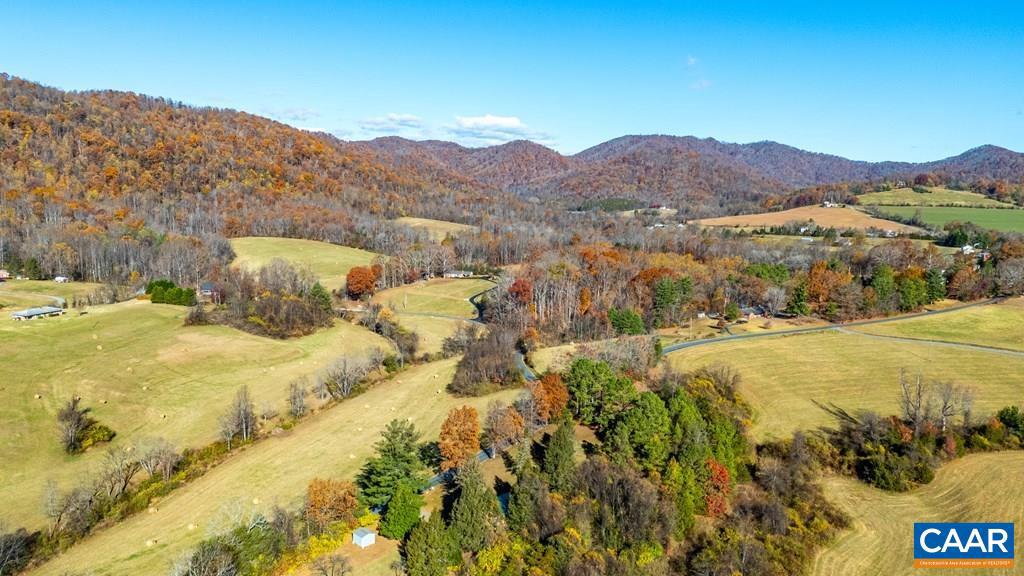 1066 Stevens Cove Road Lovingston, VA 22949 - Photo 33 of 34 a view of a house with a mountain