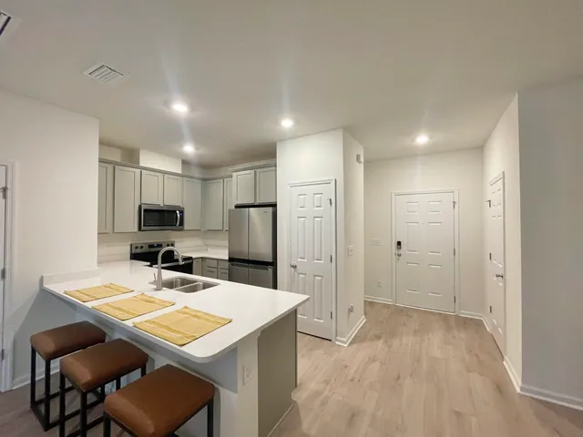 a view of a swimming pool and lounge chair
