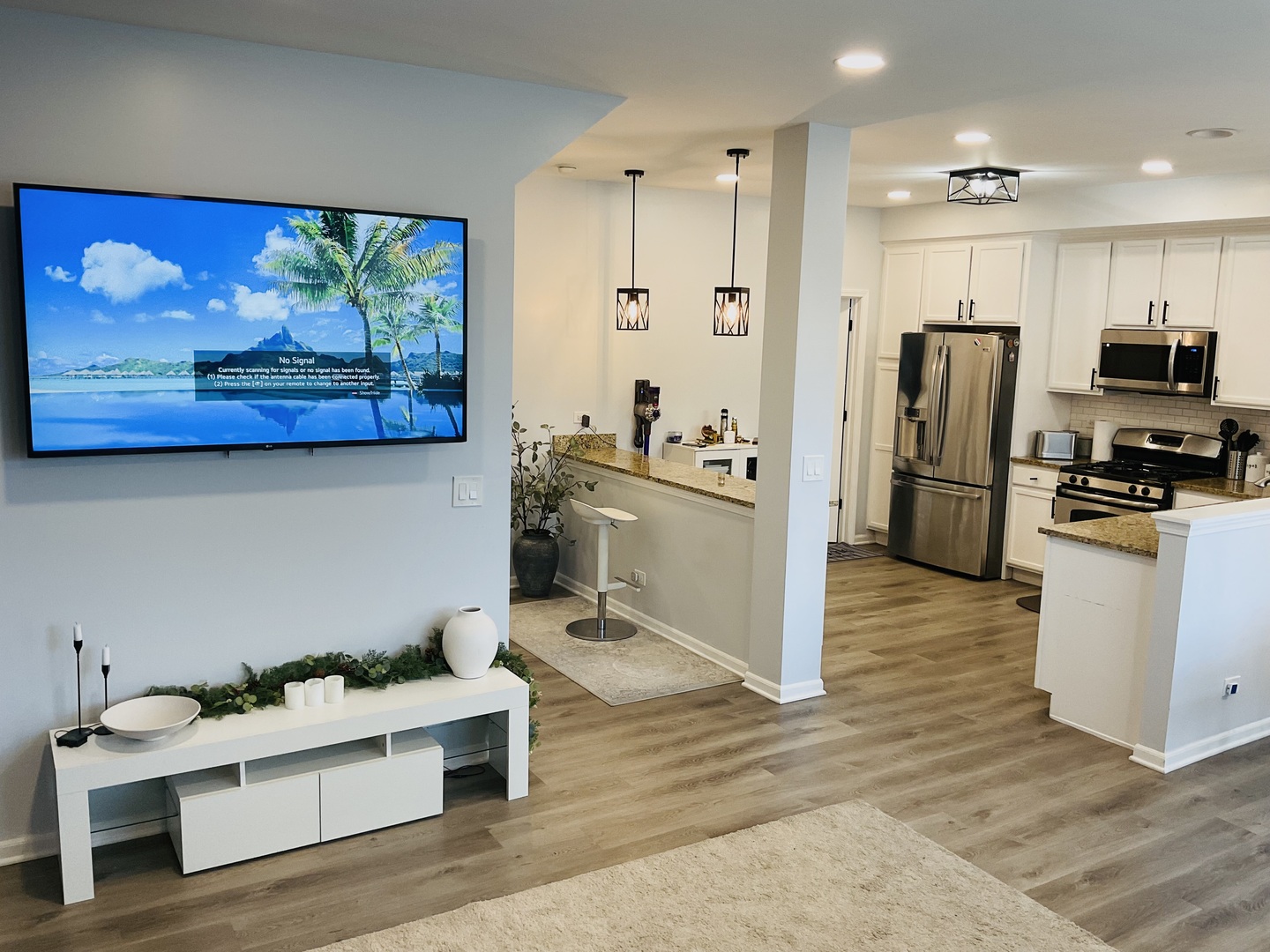 2425 Birch Street Des Plaines, IL 60018 - Photo 11 of 40 a room with stainless steel appliances kitchen island granite countertop a refrigerator stove and sink