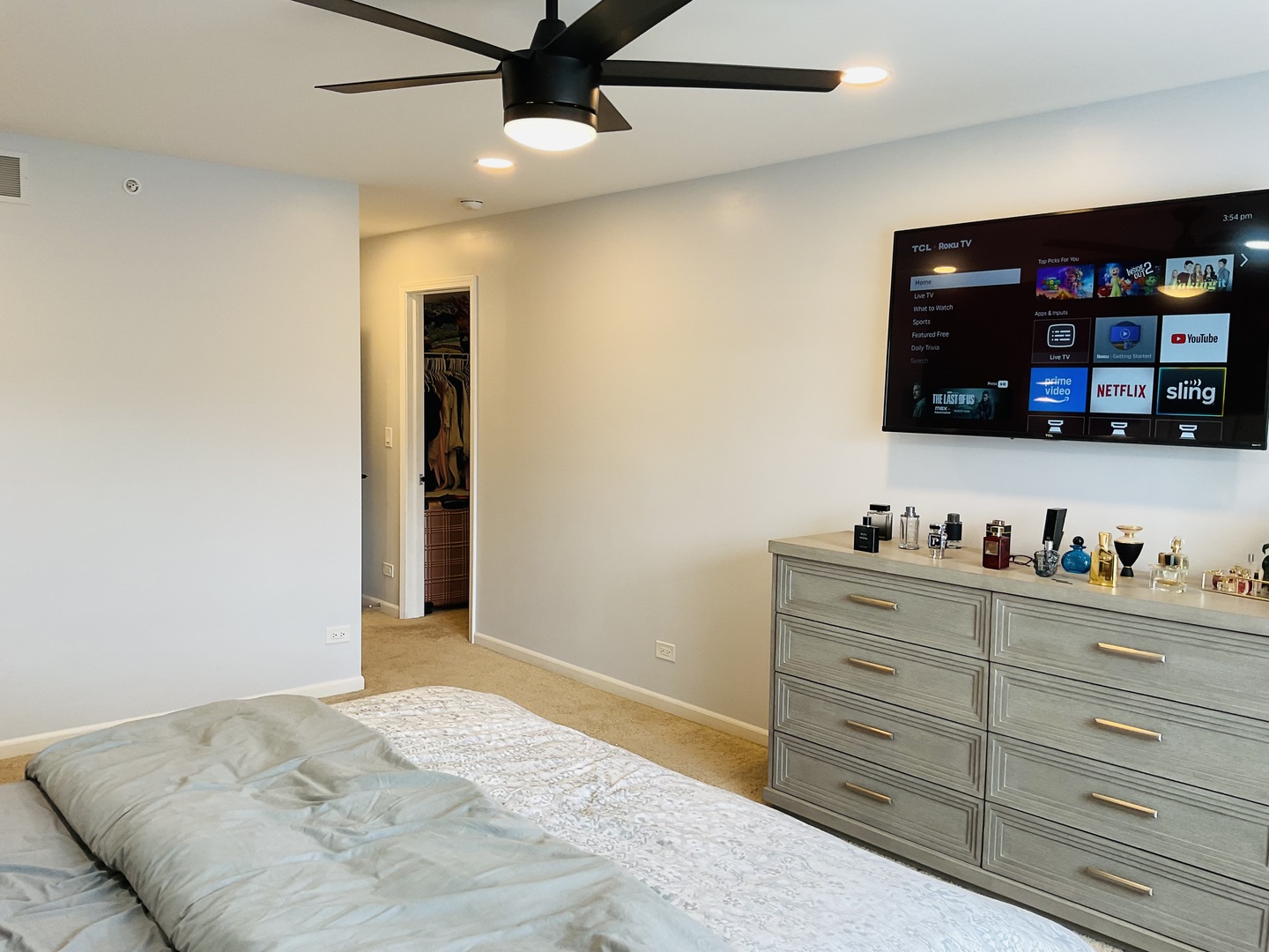 2425 Birch Street Des Plaines, IL 60018 - Photo 17 of 40 a bedroom with a bed and a television