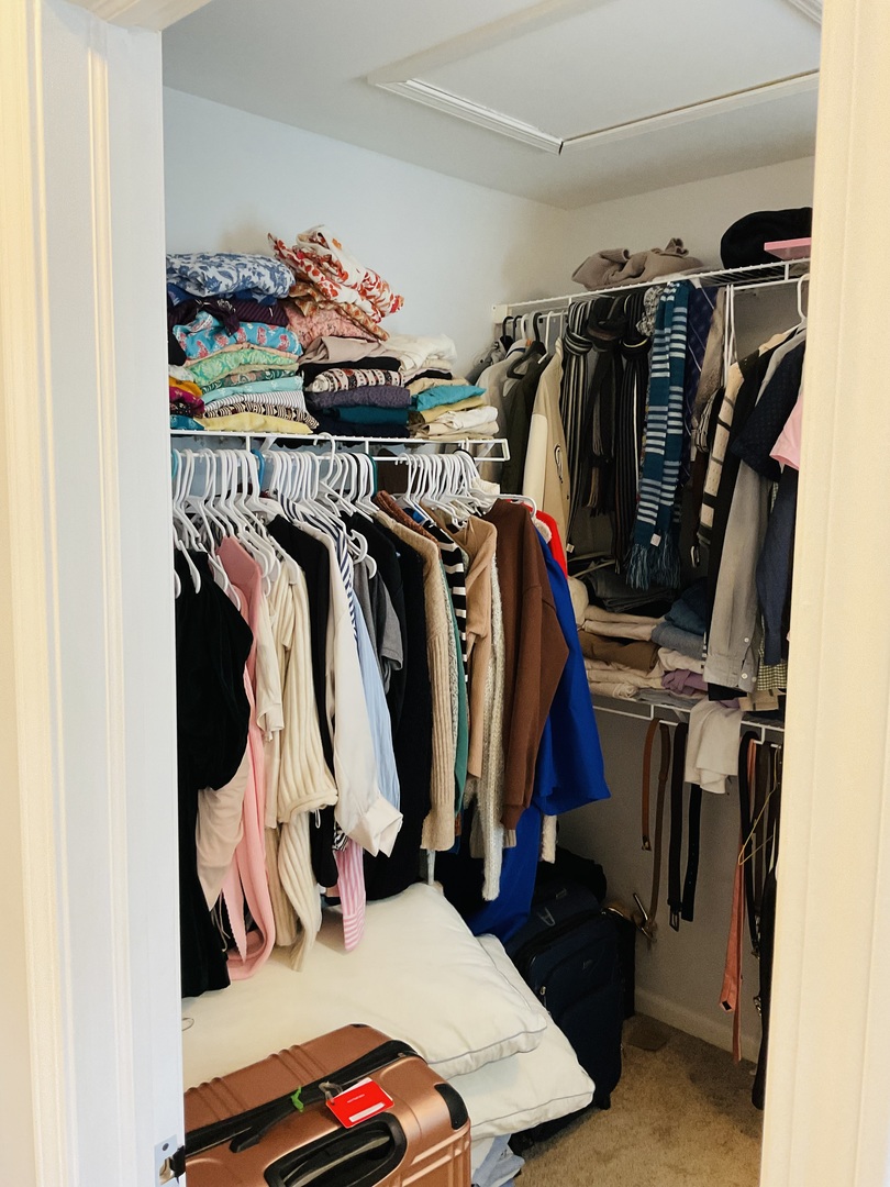 2425 Birch Street Des Plaines, IL 60018 - Photo 20 of 40 a view of walk in closet with clothes and shoes