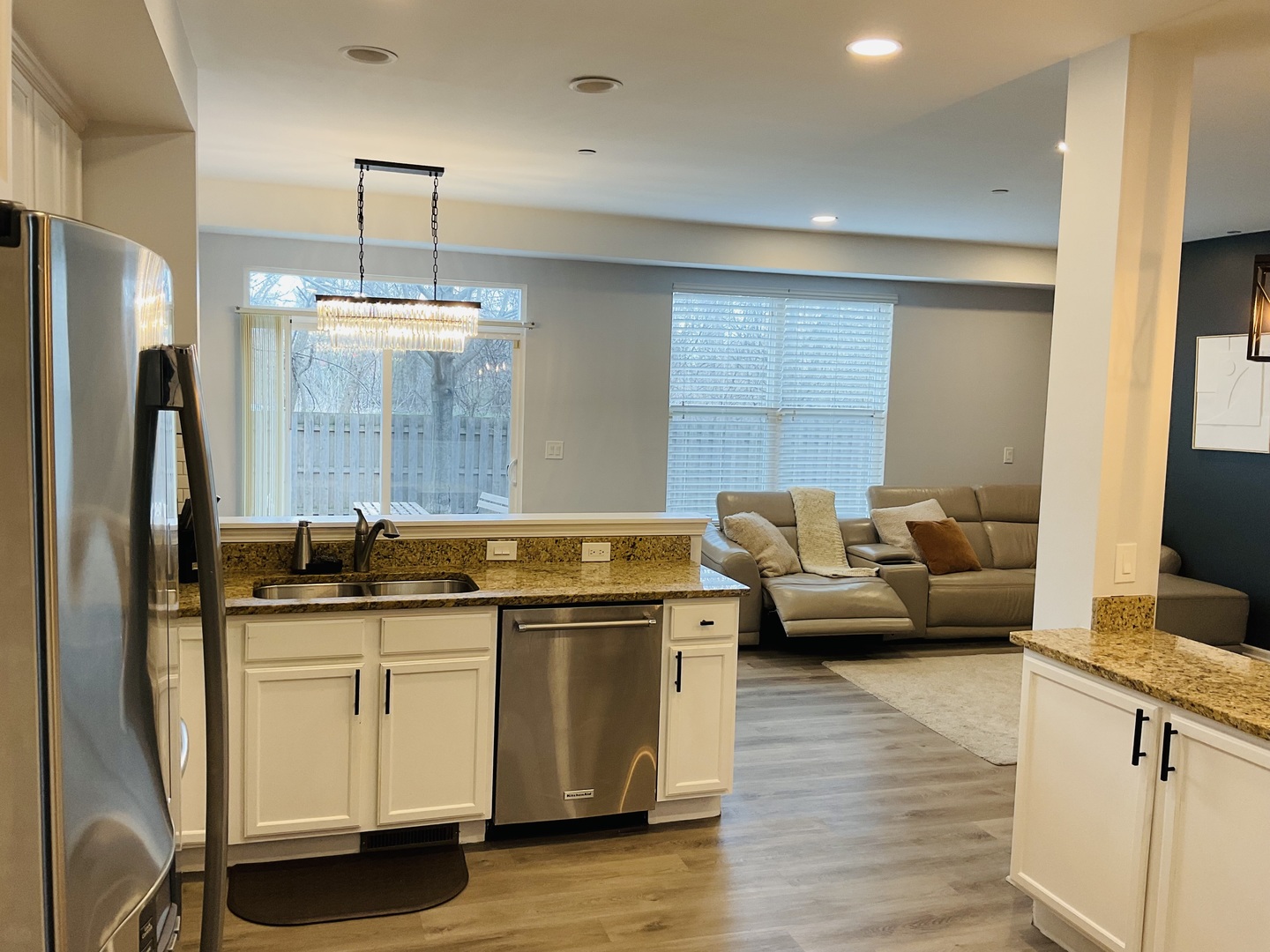2425 Birch Street Des Plaines, IL 60018 - Photo 8 of 40 a kitchen with stainless steel appliances granite countertop a sink stove and refrigerator