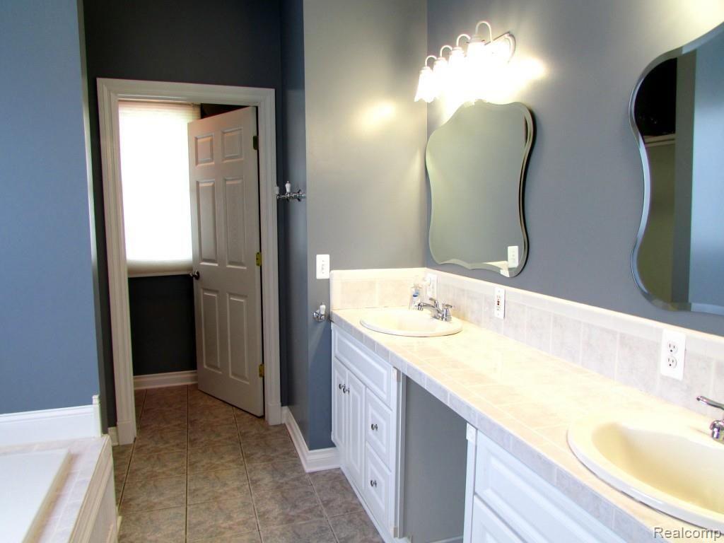 1699 Horton Lake Road Lapeer, MI 48446 - Photo 32 of 54 Master Bathroom with Watercloset
