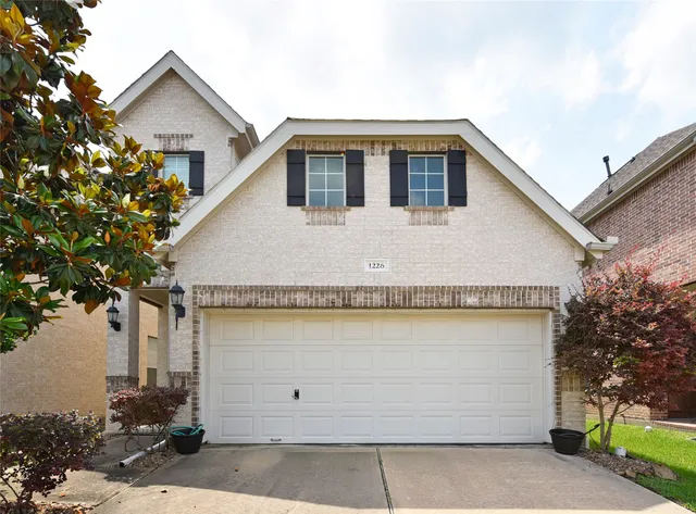 a house view with a outdoor space