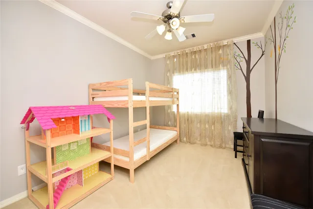 a bedroom with furniture and a chandelier