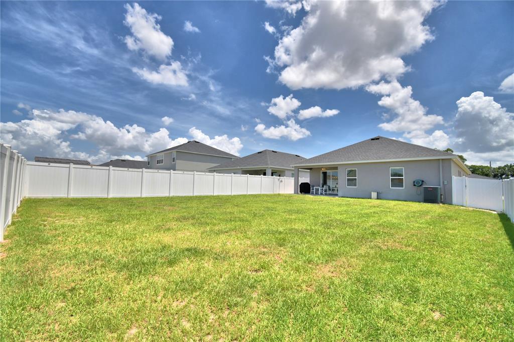 4340 Reding Way Lakeland, FL 33813 - Photo 59 of 63 a view of a house with a back yard