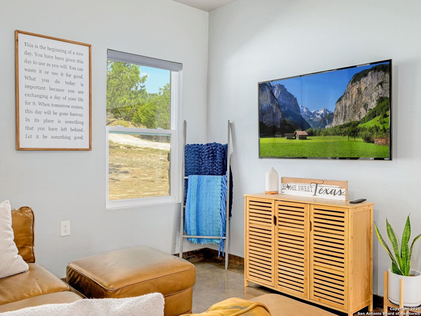 6766 Spring Branch Road Spring Branch, TX 78070 - Photo 13 of 63 a living room with furniture and a window