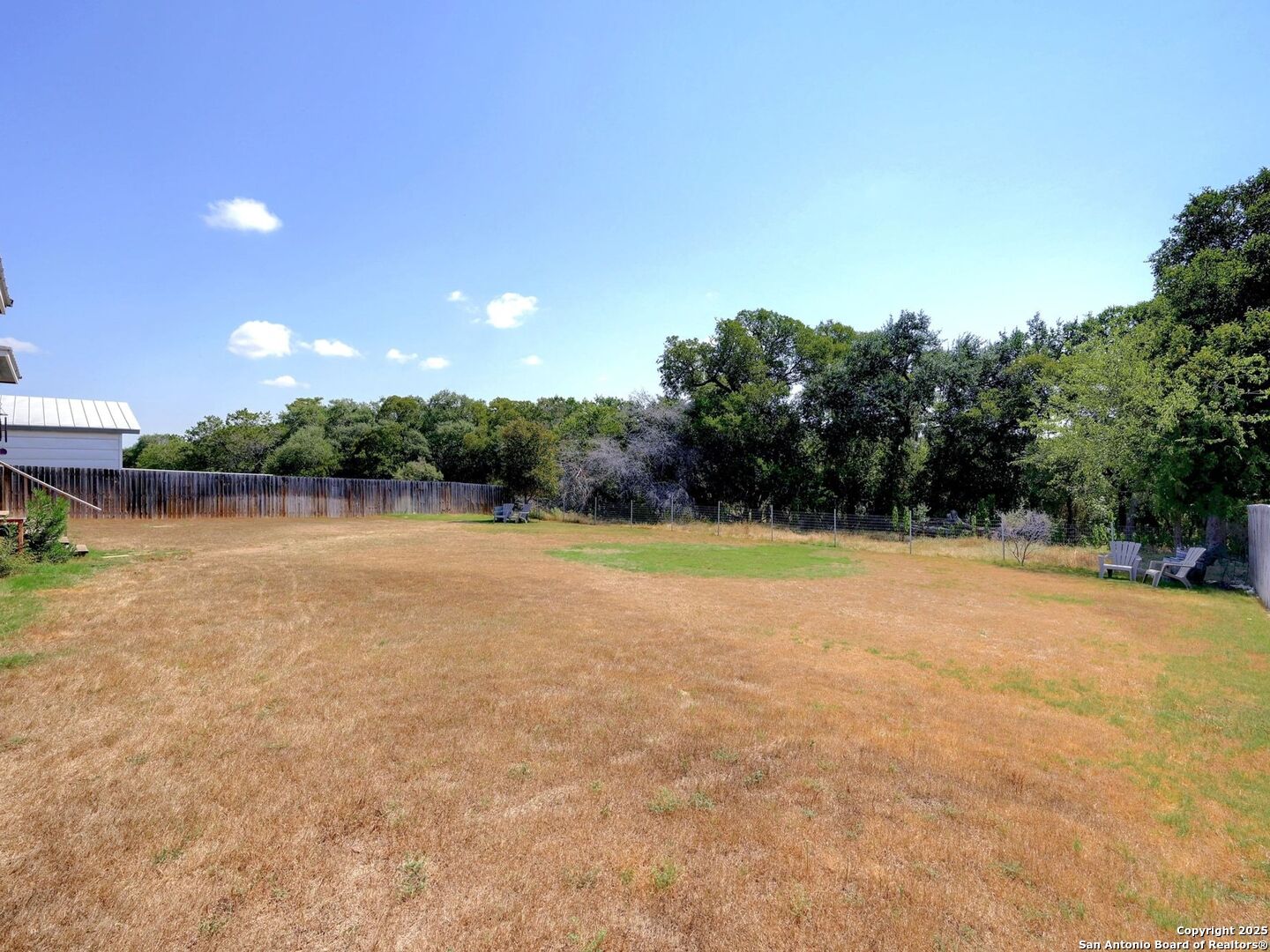 6766 Spring Branch Road Spring Branch, TX 78070 - Photo 35 of 63 a view of a outdoor space with swimming pool
