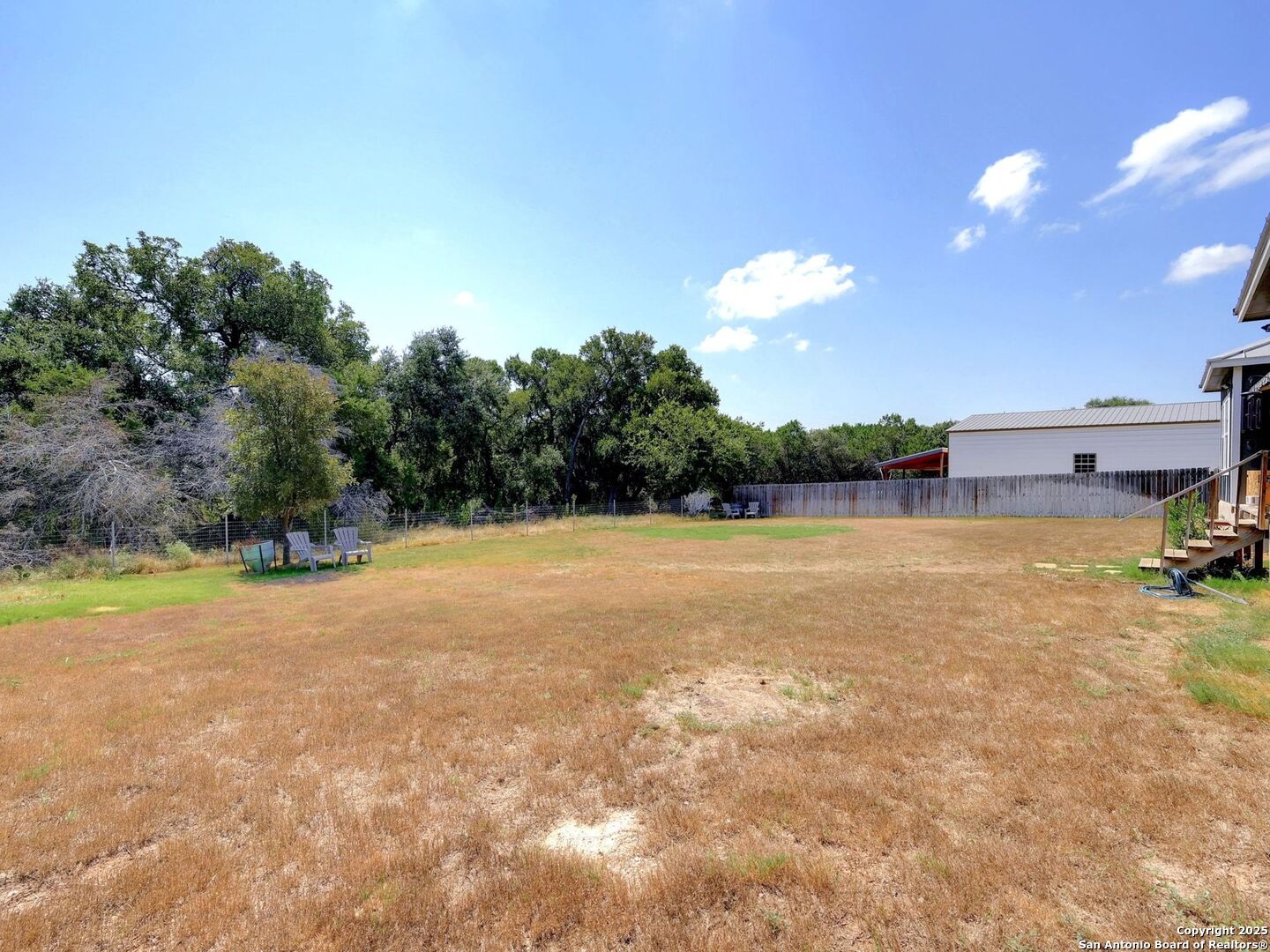 6766 Spring Branch Road Spring Branch, TX 78070 - Photo 36 of 63 a view of a outdoor space and swimming pool