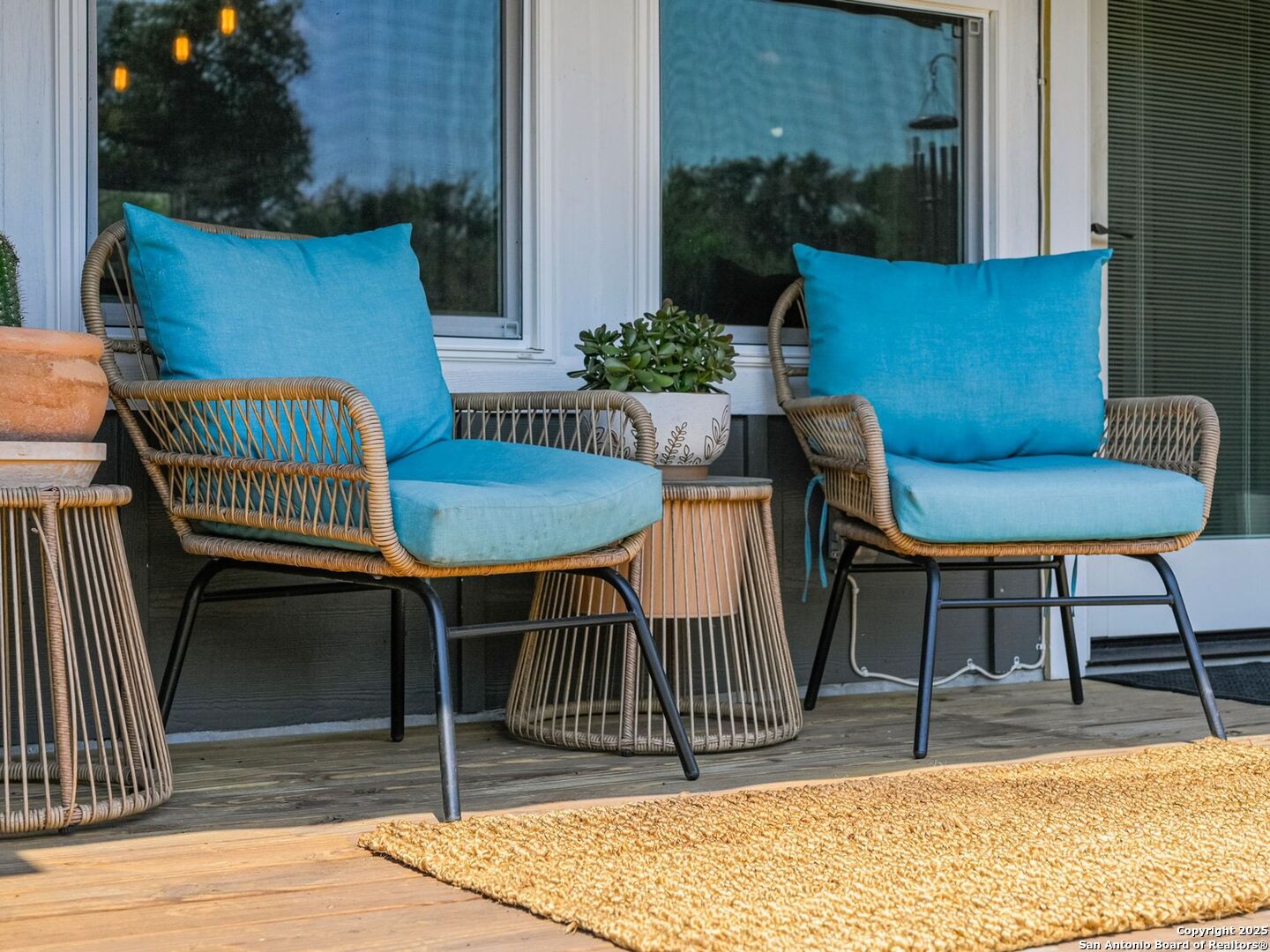 6766 Spring Branch Road Spring Branch, TX 78070 - Photo 39 of 63 a view of a chairs and table in the patio