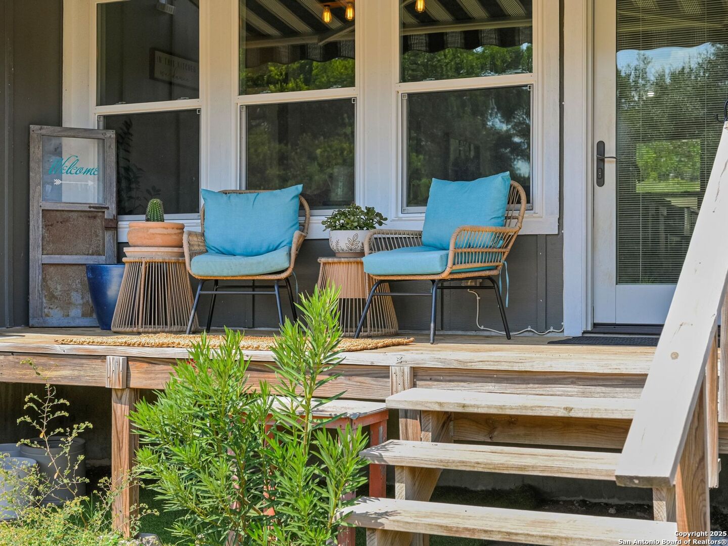 6766 Spring Branch Road Spring Branch, TX 78070 - Photo 41 of 63 a view of two chairs and table in a patio