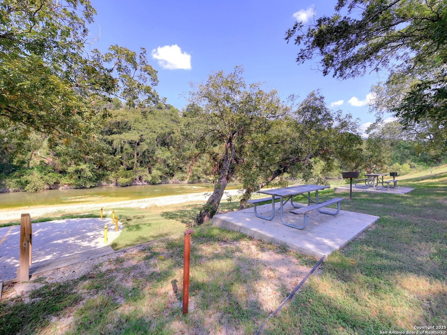 6766 Spring Branch Road Spring Branch, TX 78070 - Photo 55 of 63 a view of a yard with swimming pool