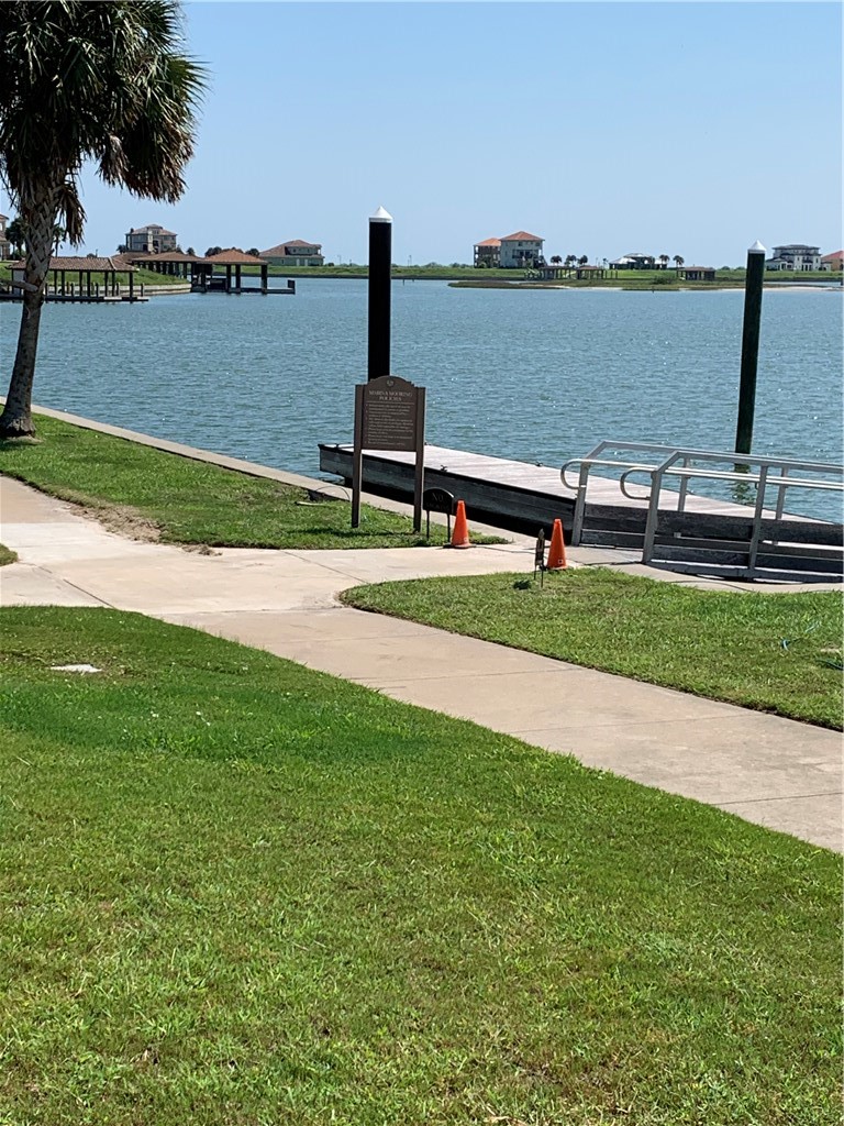 7 East Lago Loop Port O'Connor, TX 77982 - Photo 15 of 15 a view of a lake with a garden and lake view