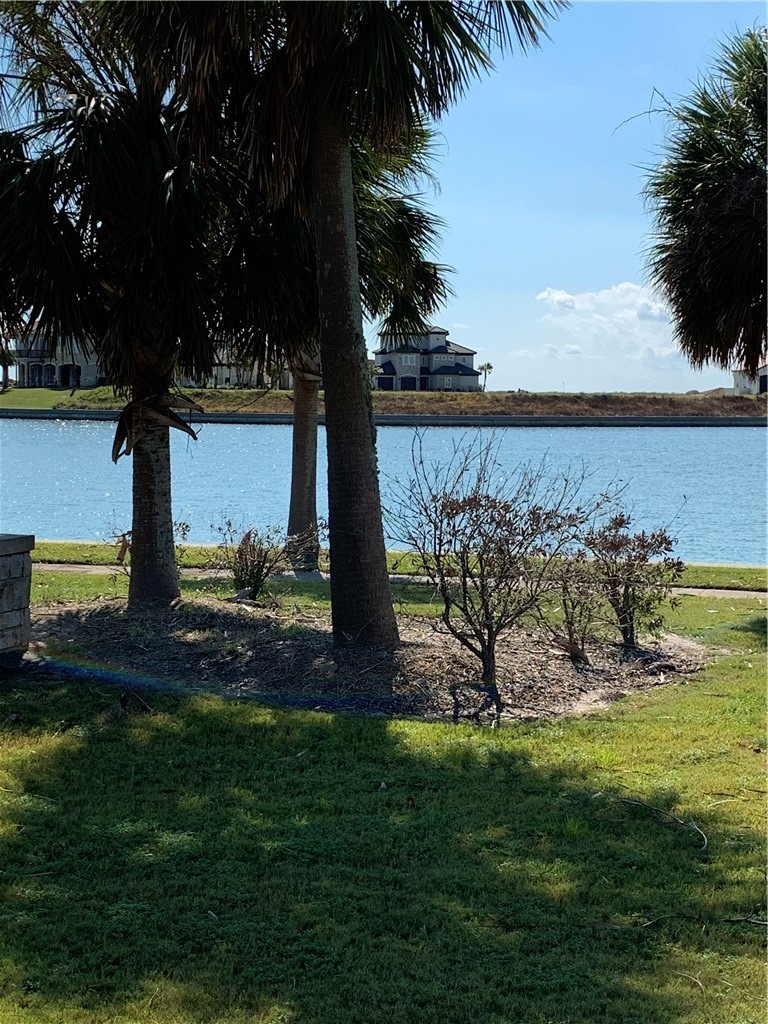 7 East Lago Loop Port O'Connor, TX 77982 - Photo 7 of 15 a view of a yard with an outdoor space