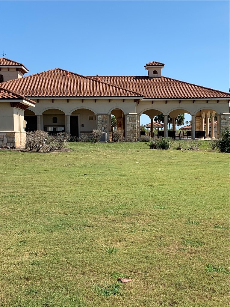 7 East Lago Loop Port O'Connor, TX 77982 - Photo 9 of 15 a view of a house with a big yard