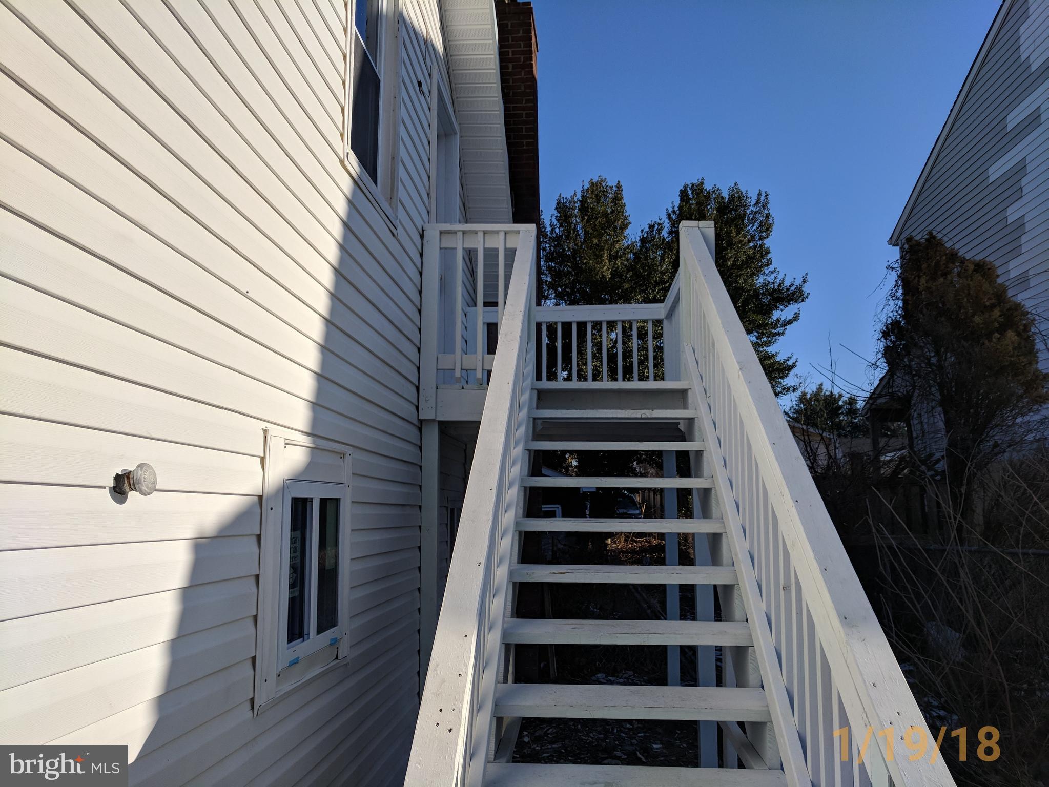 207 Cloverhill Road Pasadena, MD 21122 - Photo 27 of 27 Stairs to inlaw suite with 1 br, 1 bth and a kitch
