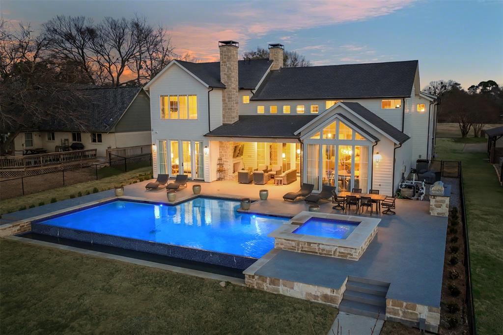 swimming pool with outdoor seating