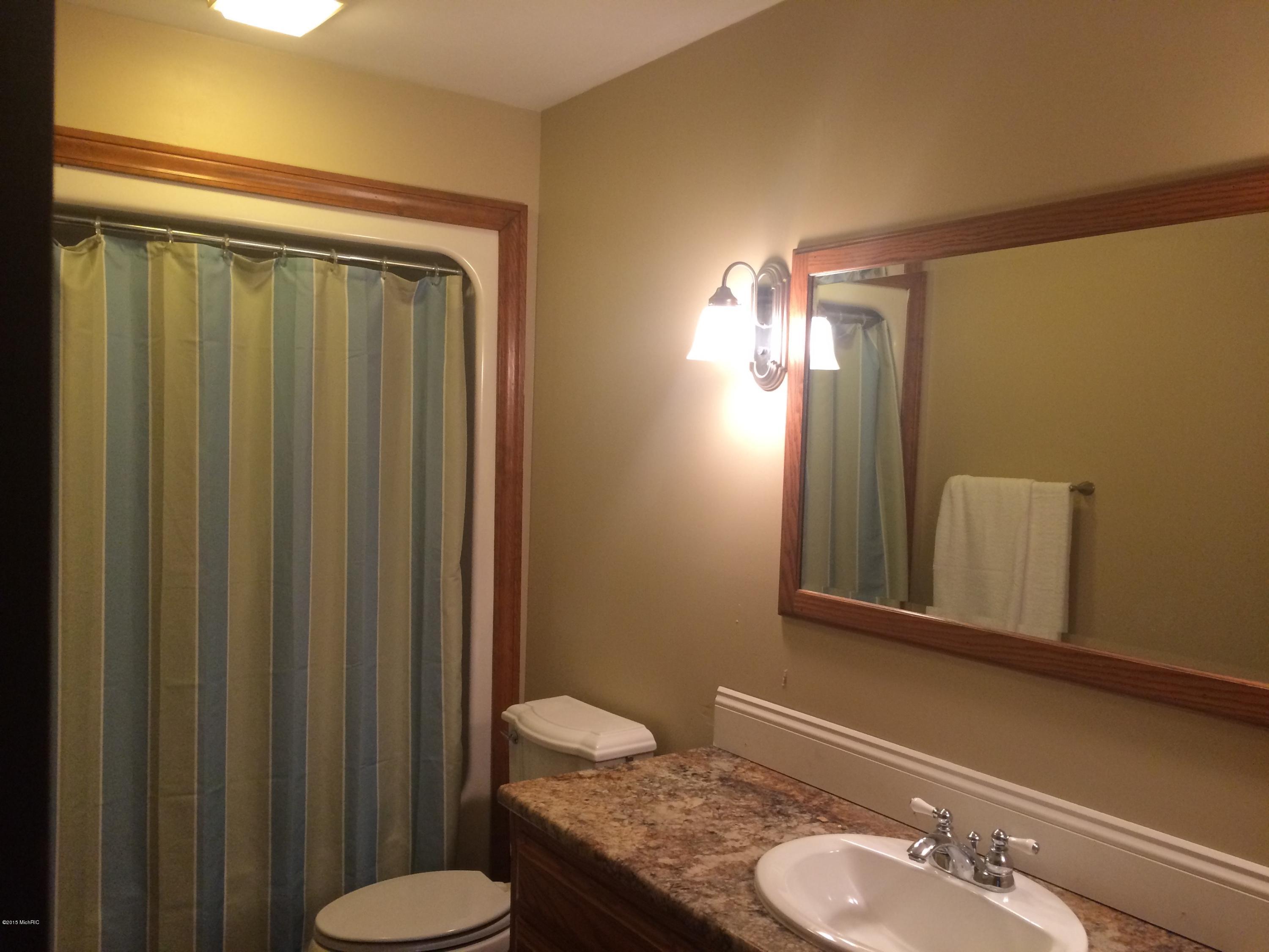 1676 Judson Road Spring Lake, MI 49456 - Photo 18 of 23 9