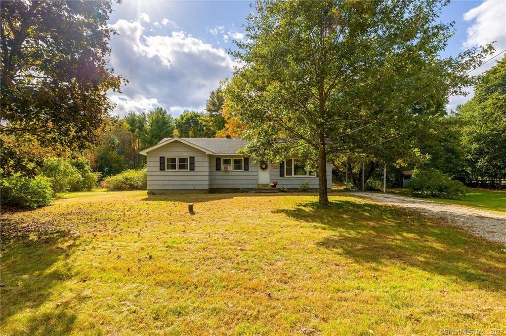 579 Wauregan Road Brooklyn, CT 06234 - Photo 1 of 1 a house view with swimming pool in front of it