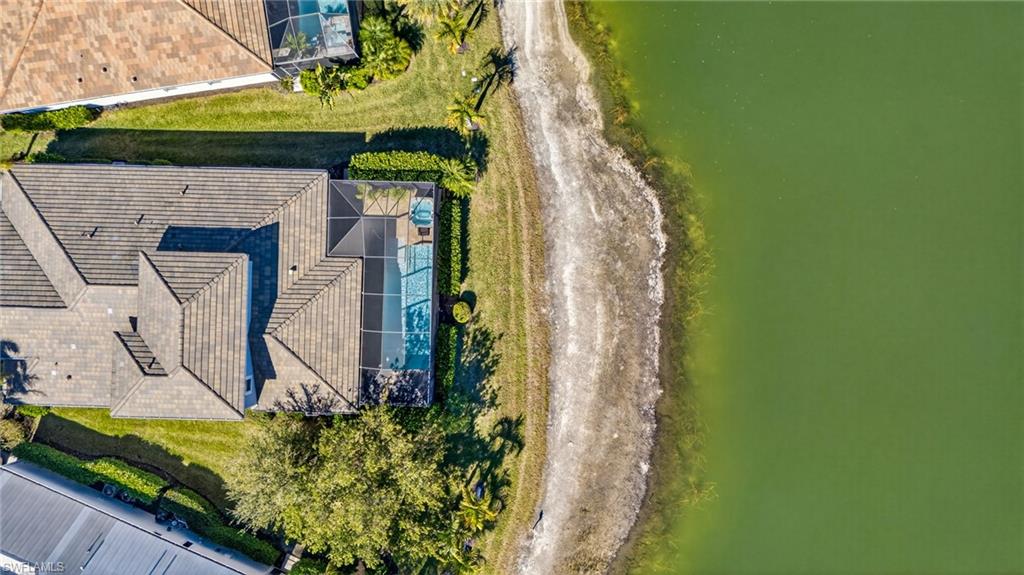 14748 Windward Lane Naples, FL 34114 - Photo 47 of 50 an aerial view of a house with a yard