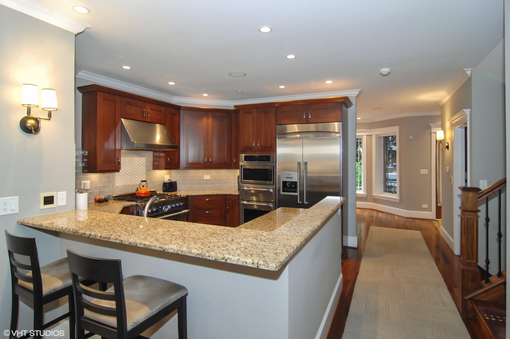 Undisclosed Address Chicago, IL 60618 - Photo 12 of 31 a large kitchen with granite countertop lots of counter space and stainless steel appliances