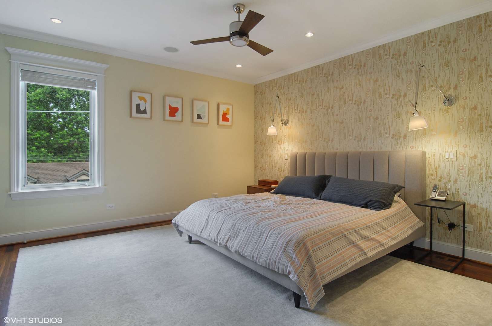 Undisclosed Address Chicago, IL 60618 - Photo 16 of 31 a bedroom with a bed ceiling fan and a window
