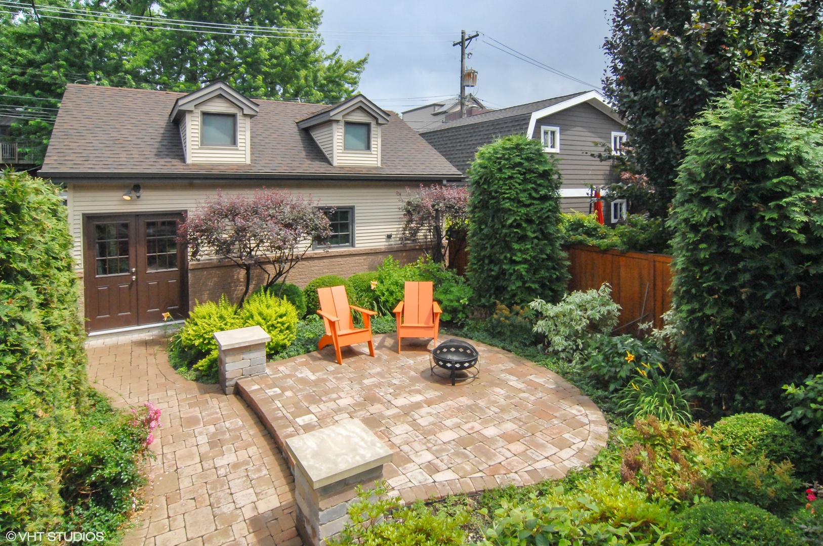 Undisclosed Address Chicago, IL 60618 - Photo 2 of 31 a front view of a house with garden