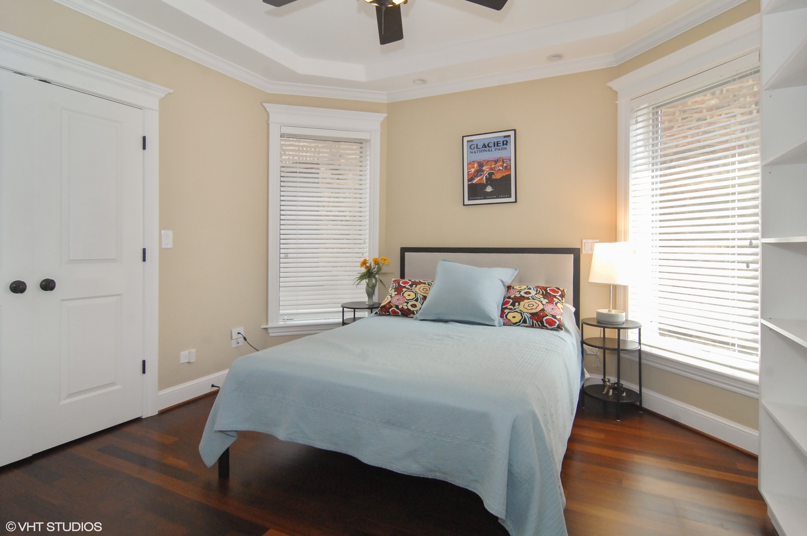 Undisclosed Address Chicago, IL 60618 - Photo 22 of 31 a bedroom with a bed and wooden floor