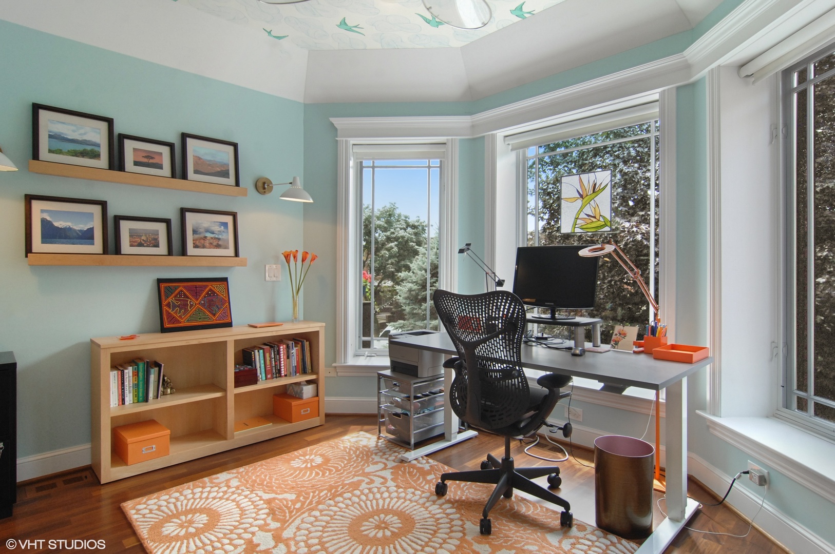 Undisclosed Address Chicago, IL 60618 - Photo 23 of 31 a view of a workspace with furniture and a window