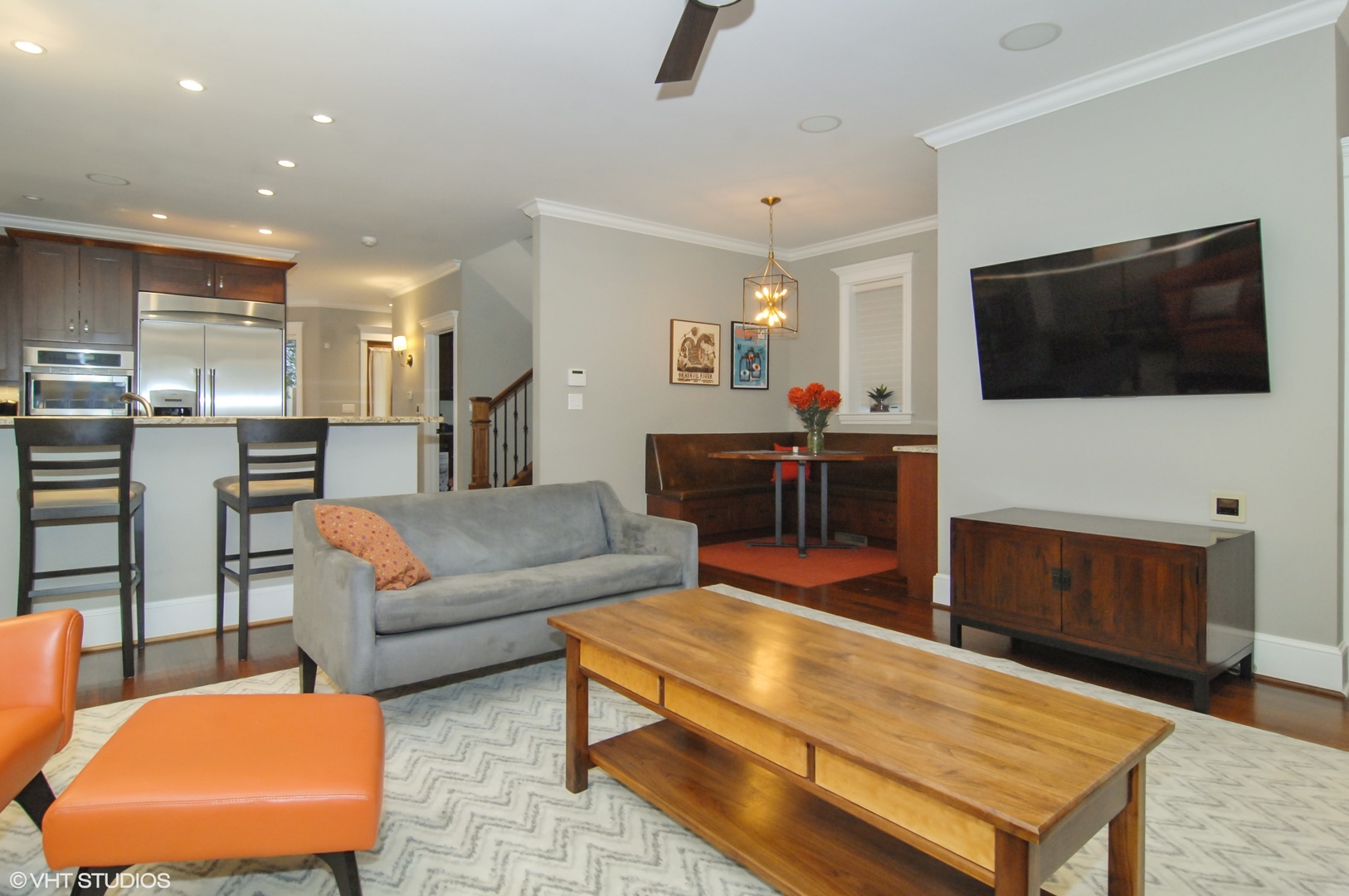 Undisclosed Address Chicago, IL 60618 - Photo 9 of 31 a living room with furniture and a flat screen tv