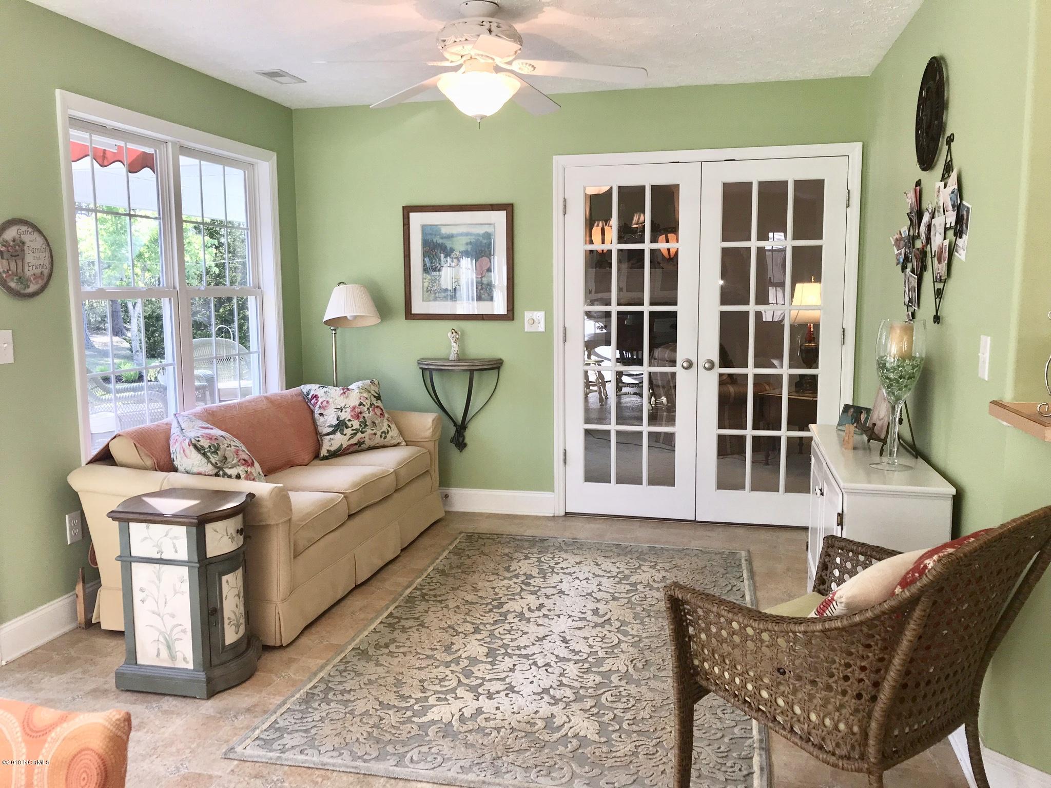 112 Sand Run Road Havelock, NC 28532 - Photo 19 of 46 Use as dining or lounging! Double doors lead to living room