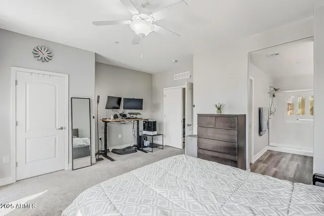 a room with a bed and a television in it