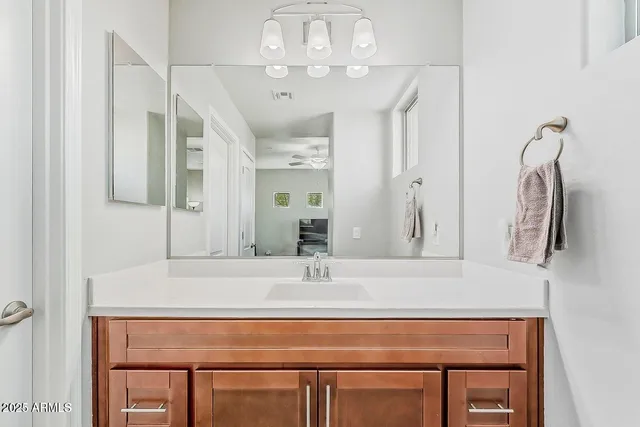 a bathroom with a shower curtain and a shower curtain