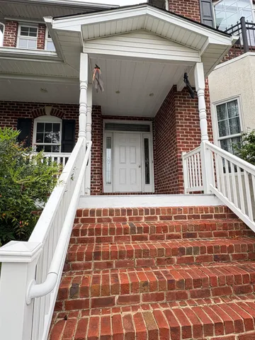 a view of a balcony with door