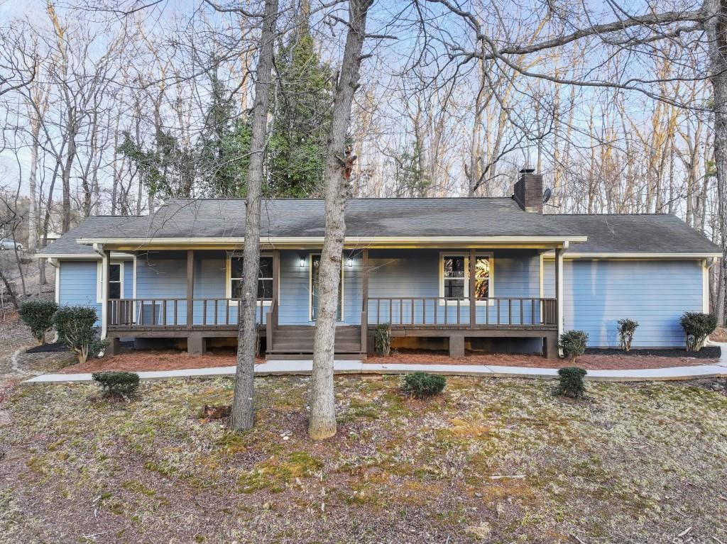 front view of a house with a yard