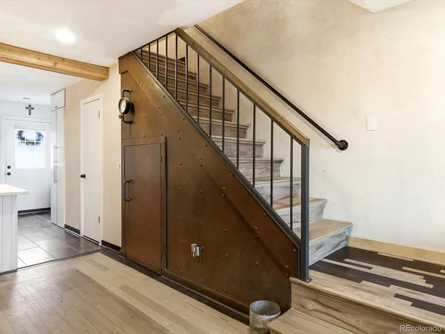 a view of a hallway with staircase