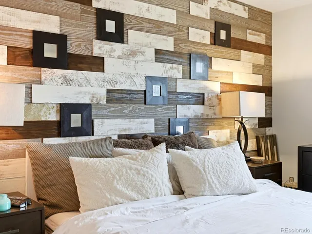 a living room with fireplace furniture and a fireplace