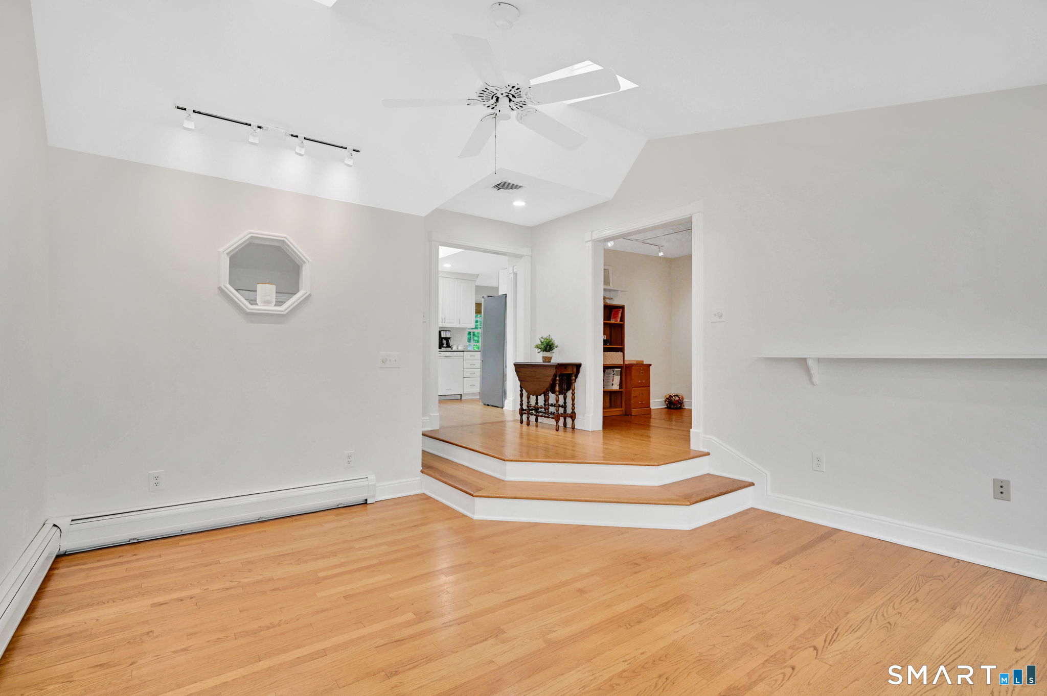 35 S Road Enfield, CT 06082 - Photo 11 of 40 Family room open to kitchen, playroom and mudroom.