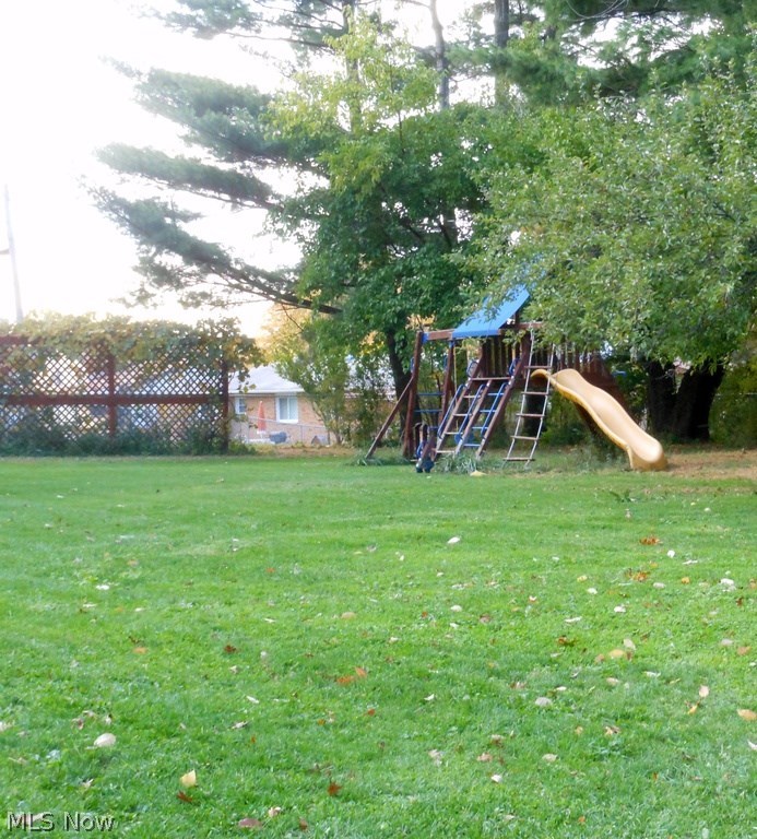 7122 Ridge Road Cleveland, OH 44129 - Photo 19 of 24 The yard of dreams... So large, you really need to walk the entire acre to appreciate all the privacy, fruit trees and views.