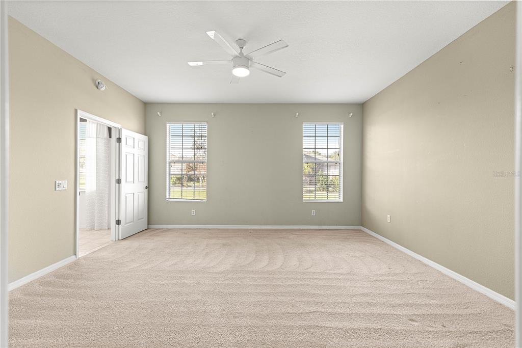 8536 Southwest 82nd Terrace Ocala, FL 34481 - Photo 13 of 47 a view of an empty room with a window