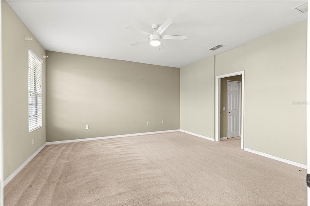 8536 Southwest 82nd Terrace Ocala, FL 34481 - Photo 14 of 47 a view of an empty room with a window