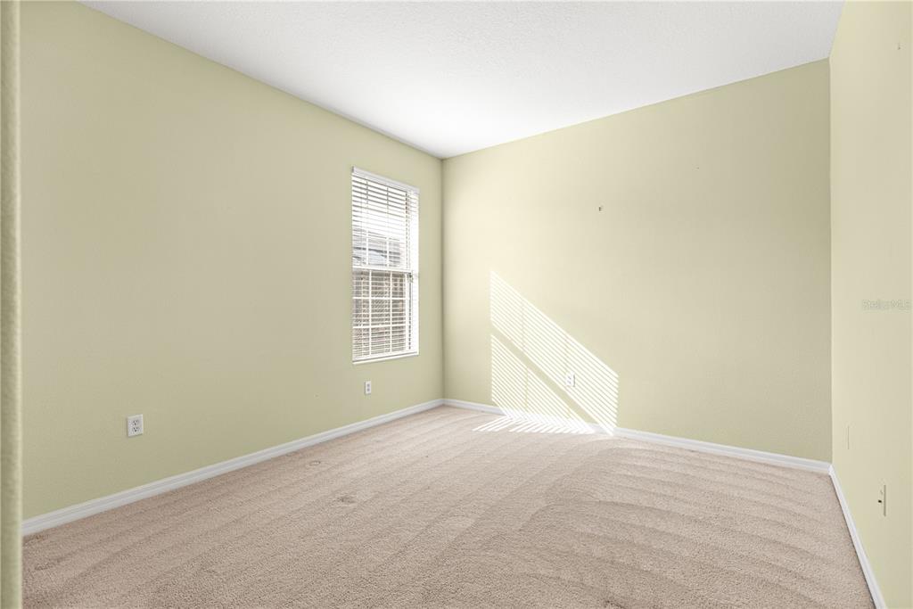 8536 Southwest 82nd Terrace Ocala, FL 34481 - Photo 21 of 47 a view of an empty room with a window