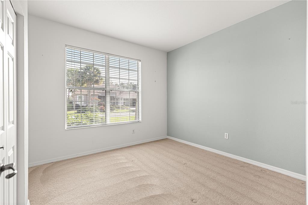 8536 Southwest 82nd Terrace Ocala, FL 34481 - Photo 23 of 47 a view of an empty room with a window