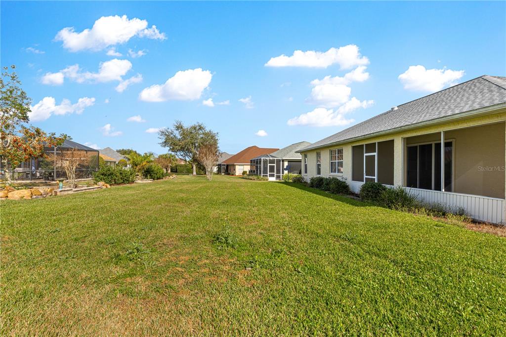8536 Southwest 82nd Terrace Ocala, FL 34481 - Photo 41 of 47 a view of an house with backyard space and balcony