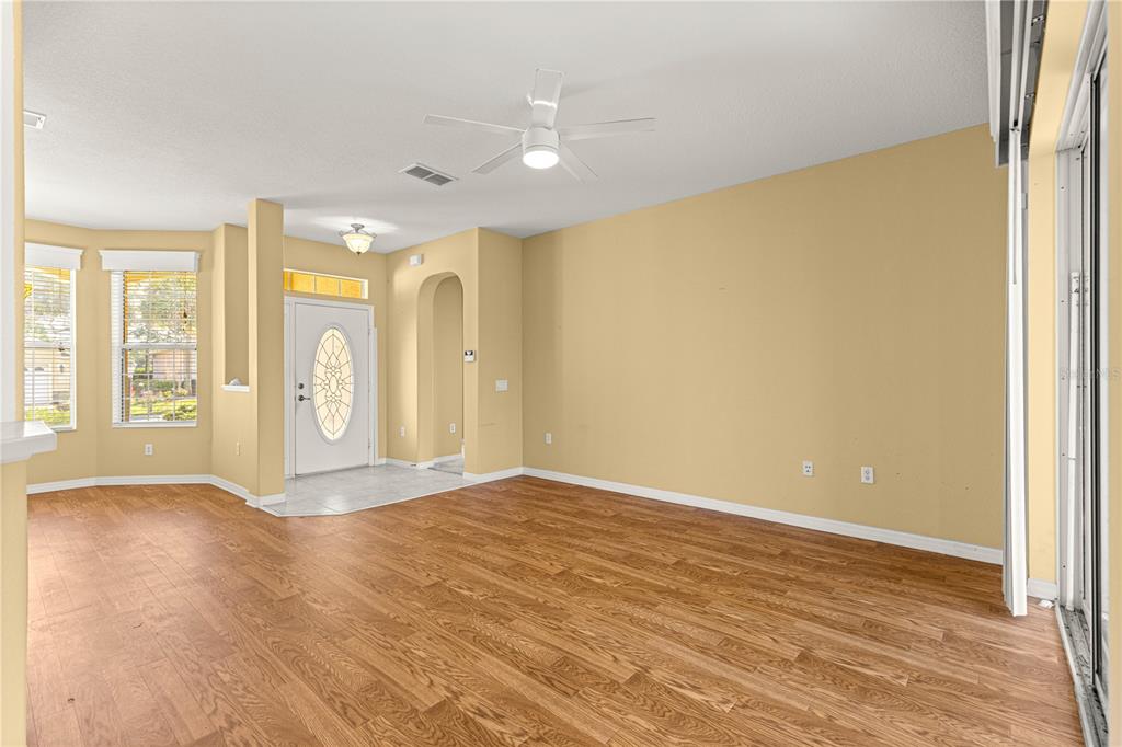 8536 Southwest 82nd Terrace Ocala, FL 34481 - Photo 6 of 47 a view of an empty room with a window