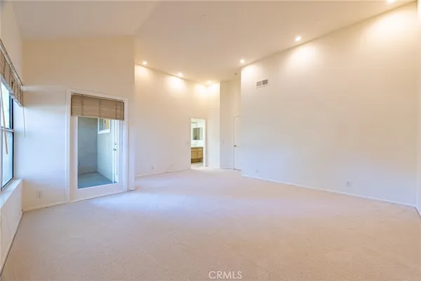 a bathroom with a sink a mirror and a shower